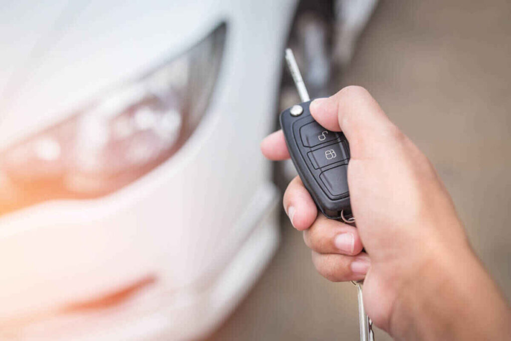 Man opening a car with a key fob